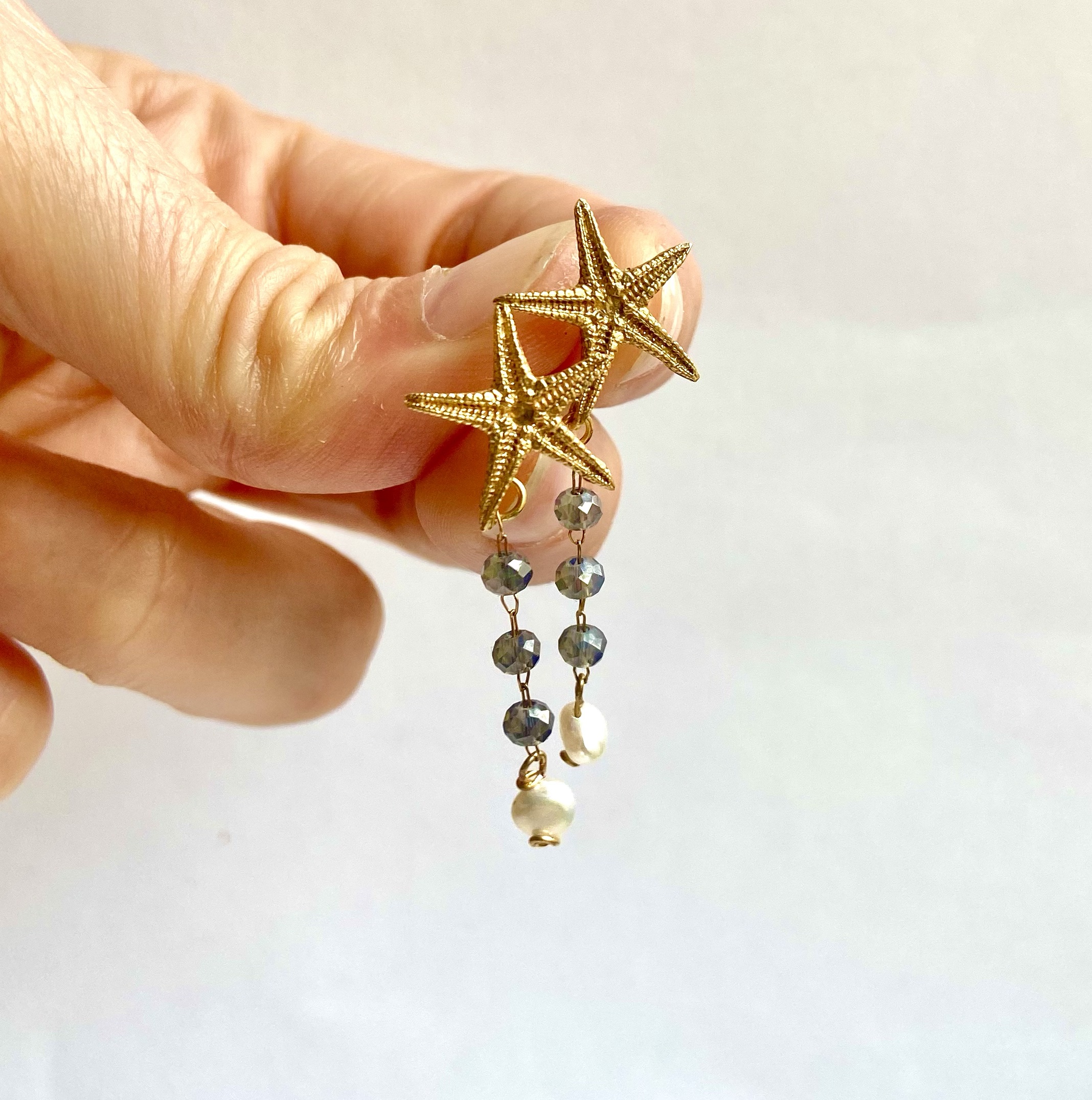 Pendientes Estrella cristal gris con perlas