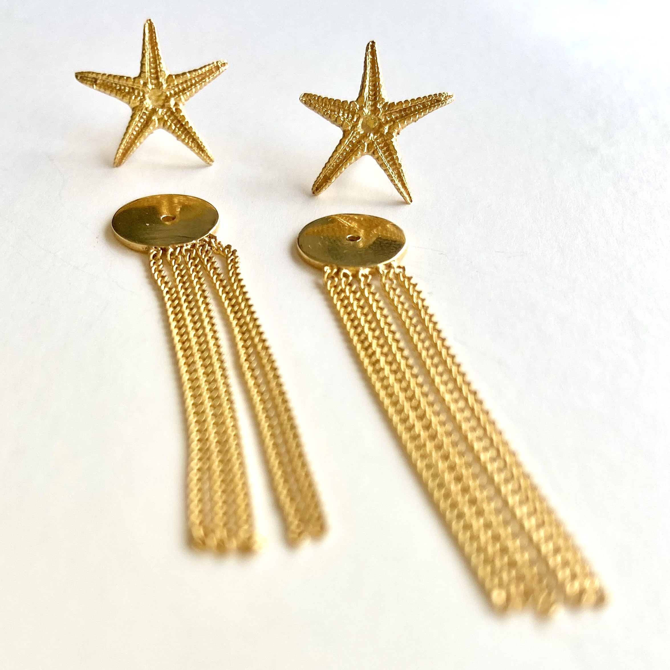 Estrella de Mar con estela oro